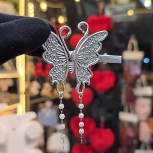 Hanging hair slide
